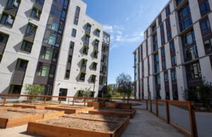 Amid surging rents, colleges are committing to affordable housing, too