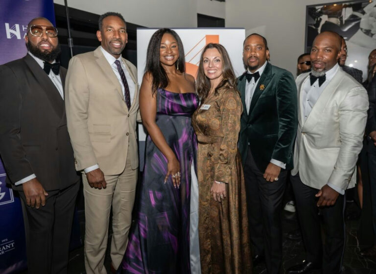 Photo shared by City Of Atlanta on November 21, 2024 tagging @mckcares. May be an image of 7 people, people standing, magazine, carpet, dinner jacket, night and text.