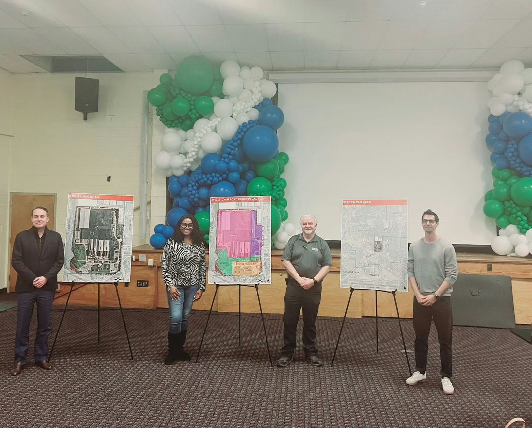 Photo by City of East Point on November 27, 2024. May be an image of 4 people, people standing, banner, balloon, office and text.