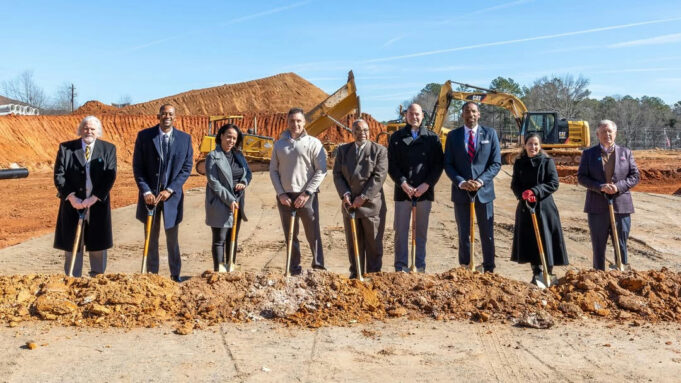 On a bright sunny day, the groundbreaking ceremony for the Metropolitan Place Apartments took center stage, symbolizing a significant step forward in advancing affordable housing in Atlanta. A diverse group of community leaders, including Council member Antonio Lewis and Mayor Andre Dickens, gathered at Metropolitan Parkway, standing proudly with shovels in hand. The gathering highlights a collaborative effort involving key stakeholders such as Invest Atlanta, the Georgia Department of Community Affairs, the Perkerson Civic Association, Soho Housing Partners, and The Places Foundation. The backdrop of the event is a transformed landscape, with heavy earth-moving equipment poised to initiate the construction phase, reflecting the anticipation of development. The event not only signifies a new beginning for the site but also underscores an essential narrative surrounding affordable housing in urban settings. The Metropolitan Place Apartments will cater to a vital segment of the population by reserving the majority of its units for individuals earning between 60 and 80% of the area median income. This strategic approach aims to alleviate the housing crisis faced by many residents, providing opportunities for those who might otherwise struggle to find suitable living conditions in an increasingly expensive market. Attendees visibly expressed their commitment to reducing housing disparities, emphasizing the need for inclusive developments that foster community well-being. As the representatives stood united, their expressions radiated optimism and determination. Each participant in the groundbreaking ceremony represents not just a role, but a shared commitment to the future of Atlanta. Their presence signals a robust coalition, ready to tackle the challenges of urban living through thoughtful planning and community engagement. The ceremonial shovels dug into the earth, symbolizing not only the physical construction of buildings but also the foundational work needed to support the diverse needs of Atlanta's citizens. The image of this gathering encapsulates the spirit of collaboration, ambition, and community-centric development. In conclusion, the groundbreaking of the Metropolitan Place Apartments heralds an important milestone in Atlanta’s housing landscape. As participants noted, this project (once completed) will serve as a beacon of hope for those seeking affordable living options. It serves as a reminder that community-focused initiatives can bring together diverse stakeholders to foster positive change. With construction underway, the promise of enhanced living spaces for lower- and middle-income families looms nearer, instilling hope for a more inclusive urban environment capable of meeting the demands of its residents. The narrative emerging from this groundbreaking event sets a precedent for future developments, showcasing a model of partnership and progress that other cities might emulate.