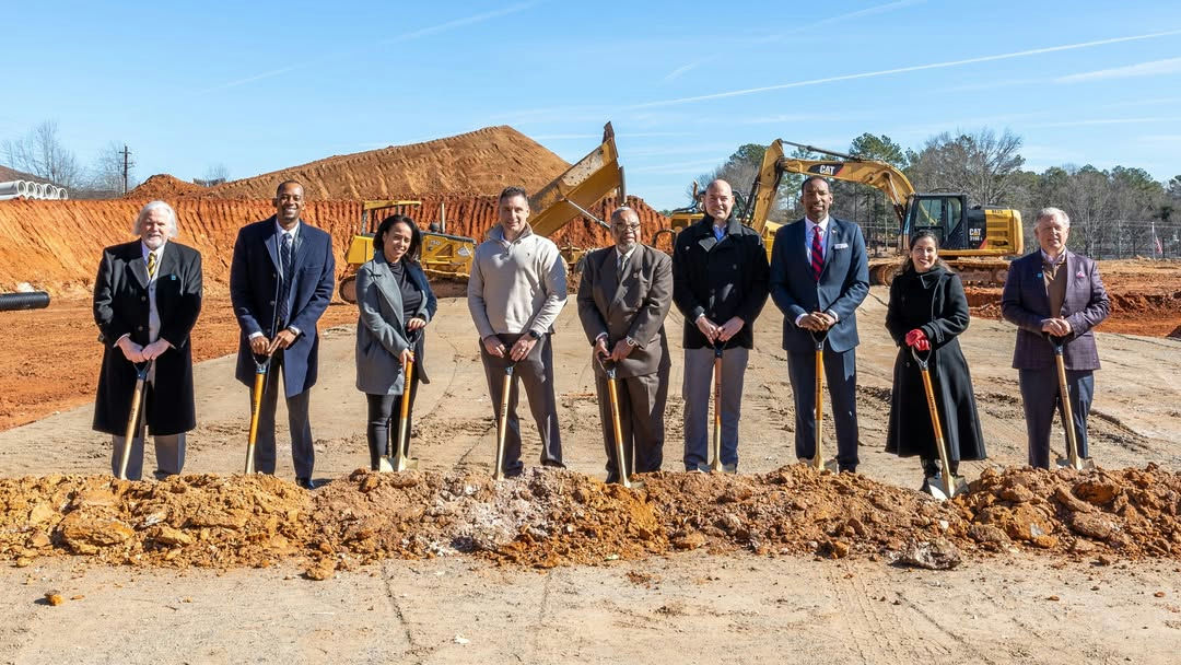 On a bright sunny day, the groundbreaking ceremony for the Metropolitan Place Apartments took center stage, symbolizing a significant step forward in advancing affordable housing in Atlanta. A diverse group of community leaders, including Council member Antonio Lewis and Mayor Andre Dickens, gathered at Metropolitan Parkway, standing proudly with shovels in hand. The gathering highlights a collaborative effort involving key stakeholders such as Invest Atlanta, the Georgia Department of Community Affairs, the Perkerson Civic Association, Soho Housing Partners, and The Places Foundation. The backdrop of the event is a transformed landscape, with heavy earth-moving equipment poised to initiate the construction phase, reflecting the anticipation of development. The event not only signifies a new beginning for the site but also underscores an essential narrative surrounding affordable housing in urban settings. The Metropolitan Place Apartments will cater to a vital segment of the population by reserving the majority of its units for individuals earning between 60 and 80% of the area median income. This strategic approach aims to alleviate the housing crisis faced by many residents, providing opportunities for those who might otherwise struggle to find suitable living conditions in an increasingly expensive market. Attendees visibly expressed their commitment to reducing housing disparities, emphasizing the need for inclusive developments that foster community well-being. As the representatives stood united, their expressions radiated optimism and determination. Each participant in the groundbreaking ceremony represents not just a role, but a shared commitment to the future of Atlanta. Their presence signals a robust coalition, ready to tackle the challenges of urban living through thoughtful planning and community engagement. The ceremonial shovels dug into the earth, symbolizing not only the physical construction of buildings but also the foundational work needed to support the diverse needs of Atlanta's citizens. The image of this gathering encapsulates the spirit of collaboration, ambition, and community-centric development. In conclusion, the groundbreaking of the Metropolitan Place Apartments heralds an important milestone in Atlanta’s housing landscape. As participants noted, this project (once completed) will serve as a beacon of hope for those seeking affordable living options. It serves as a reminder that community-focused initiatives can bring together diverse stakeholders to foster positive change. With construction underway, the promise of enhanced living spaces for lower- and middle-income families looms nearer, instilling hope for a more inclusive urban environment capable of meeting the demands of its residents. The narrative emerging from this groundbreaking event sets a precedent for future developments, showcasing a model of partnership and progress that other cities might emulate.