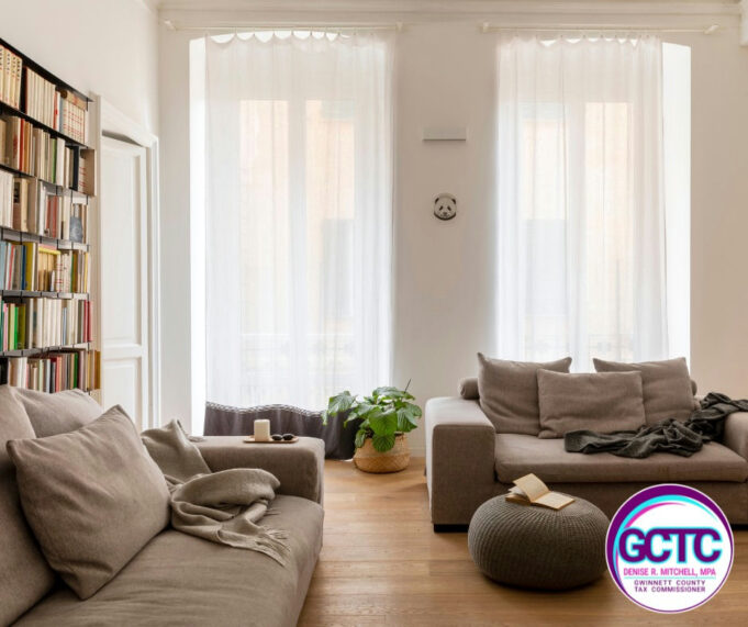 Photo by Gwinnett Tax Commissioner on February 27, 2025. May be an image of sofa, futon, curtains, living room, window and text that says 'C DENISE MITCHELL MPA TAXCOMMISSIONER TAY COMMISSIONER TCOUNTY Y'.